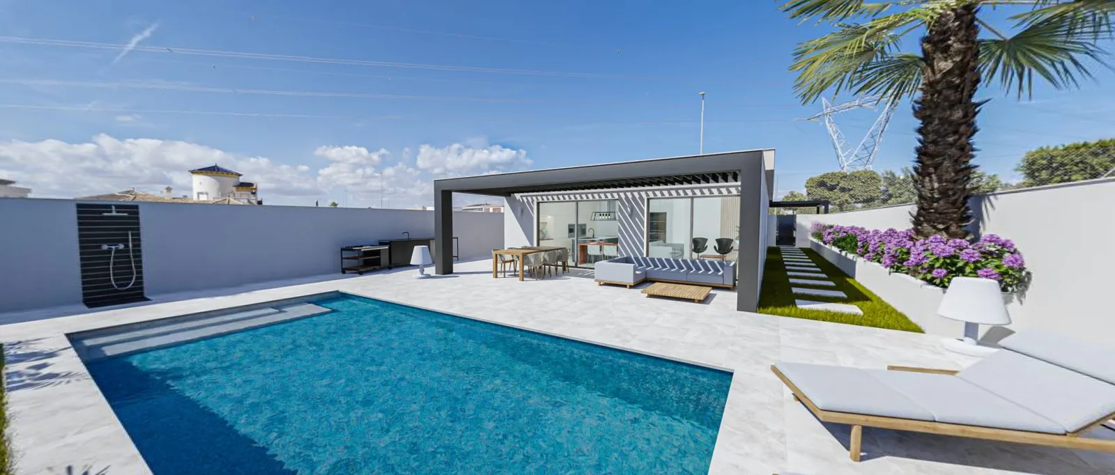 Zona de piscina de Casa Oasis terminada, con pérgola, tarima de madera y palmeras